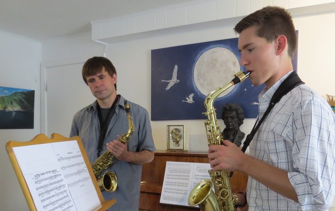 Mark Luger teaching a student in his private music studio in Wayzata.